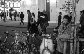 Homeless man with bikes